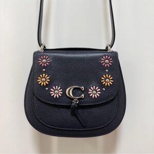 Coach Remi Saddle Bag Midnight Pebble Leather Daisy Appliqué